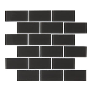 A black brick wall with some white bricks