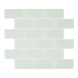 A white brick wall with some small squares