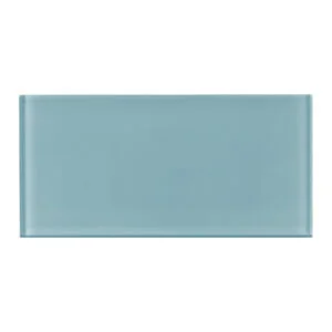 A light blue glass tile wall.