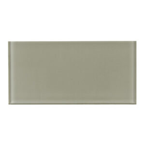 A light green tile with a white border.