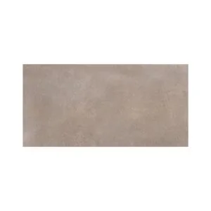 A beige tile floor with no grout.