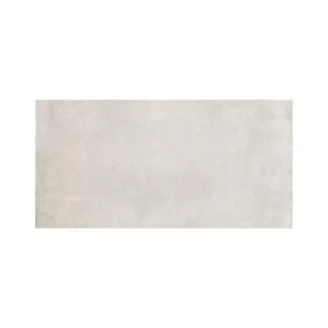 A white tile floor with no grout.