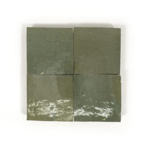 A square of green tile on top of white background.