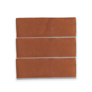 A brown tile with three strips of the same color.