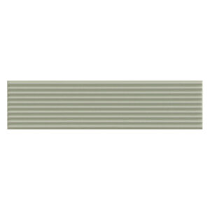 A light green strip of paper on top of a white surface.