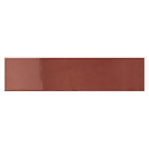 A brown strip of paper on top of a white surface.