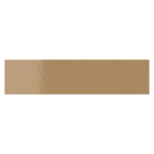 A tan strip of paper with the word " brown " written on it.