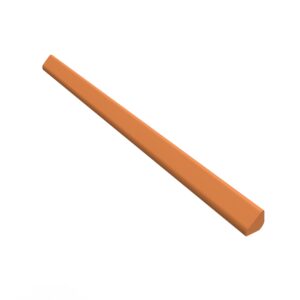 A wooden stick is laying on top of the floor.
