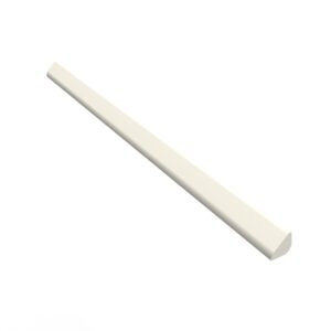 A white piece of wood is laying on the ground.