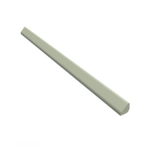 A white piece of wood is laying on top of it.
